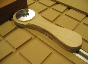 Close up of cam lever in action. The lever is made from Baltic Birch Plywood.